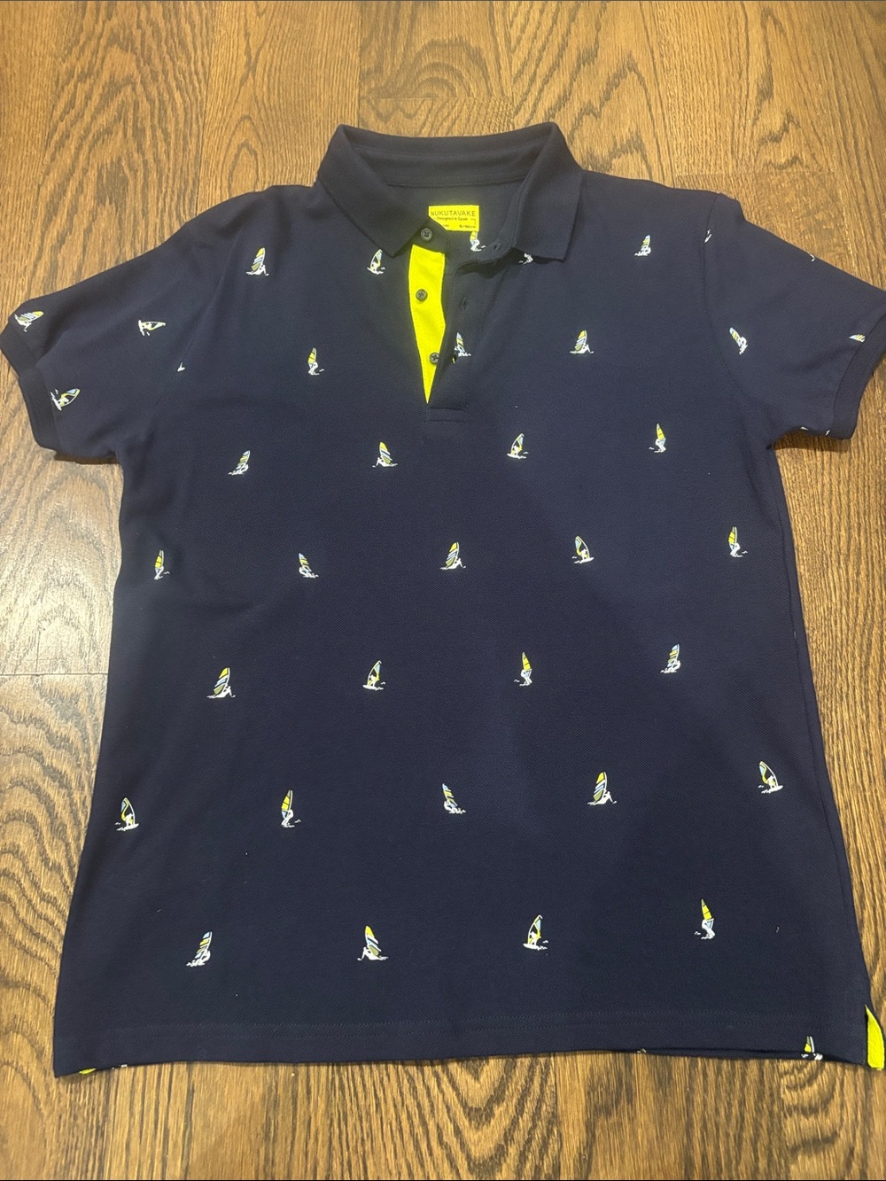 Boys (10/12) Navy Polo Shirt with Yellow Sailboat Embroidery